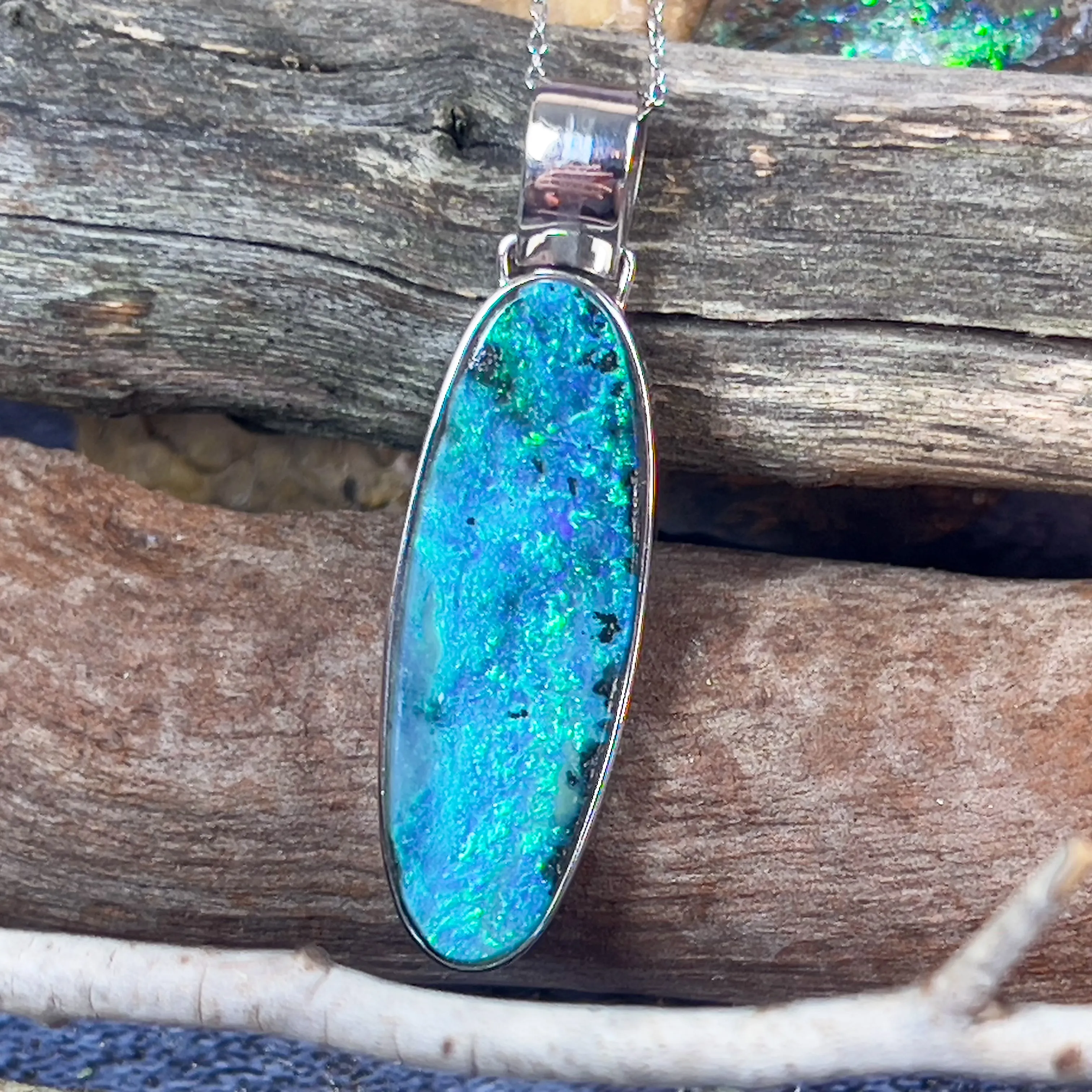 14kt White Gold long oval shape Boulder Opal 22.03ct pendant