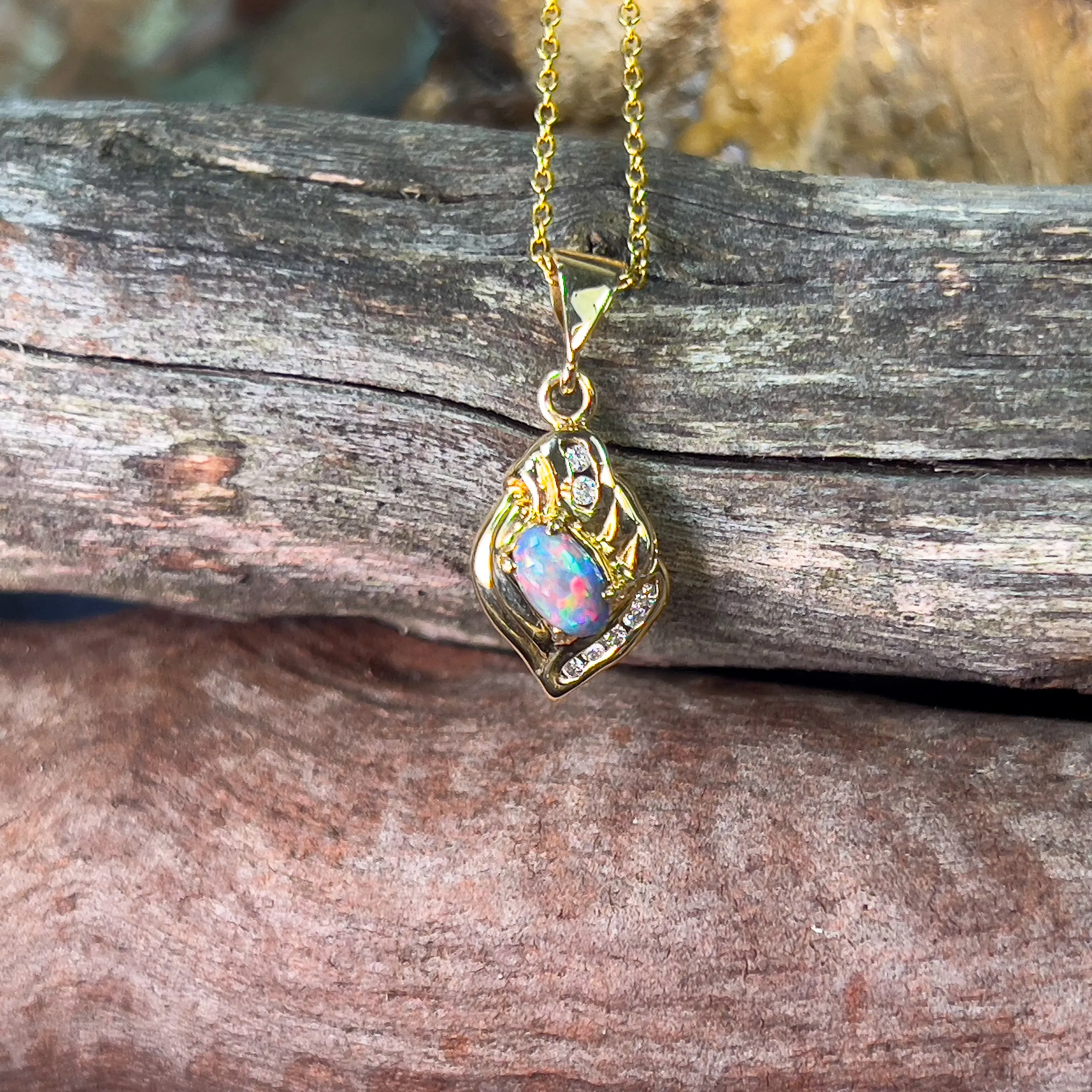 18kt Yellow Gold Black Opal 0.45ct pendant